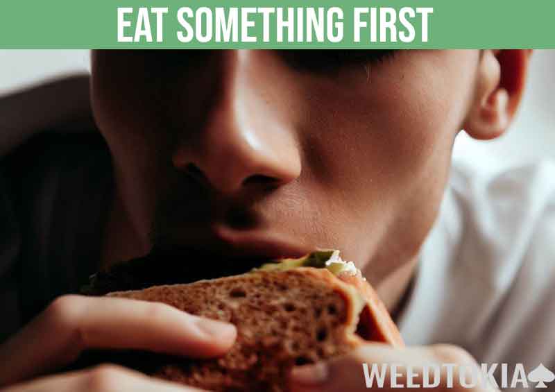 Guy eating a sandwich